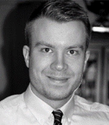 A picture containing person, necktie, person, indoor
Description automatically generated